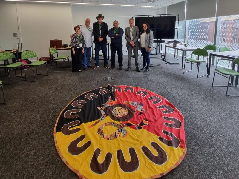 Dr Rosetta Romano and her colleagues at a cyber security conference in New Zealand