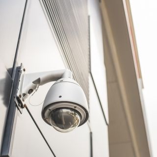 CCTV camera on the side of a building