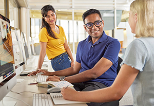Students working together at a computer